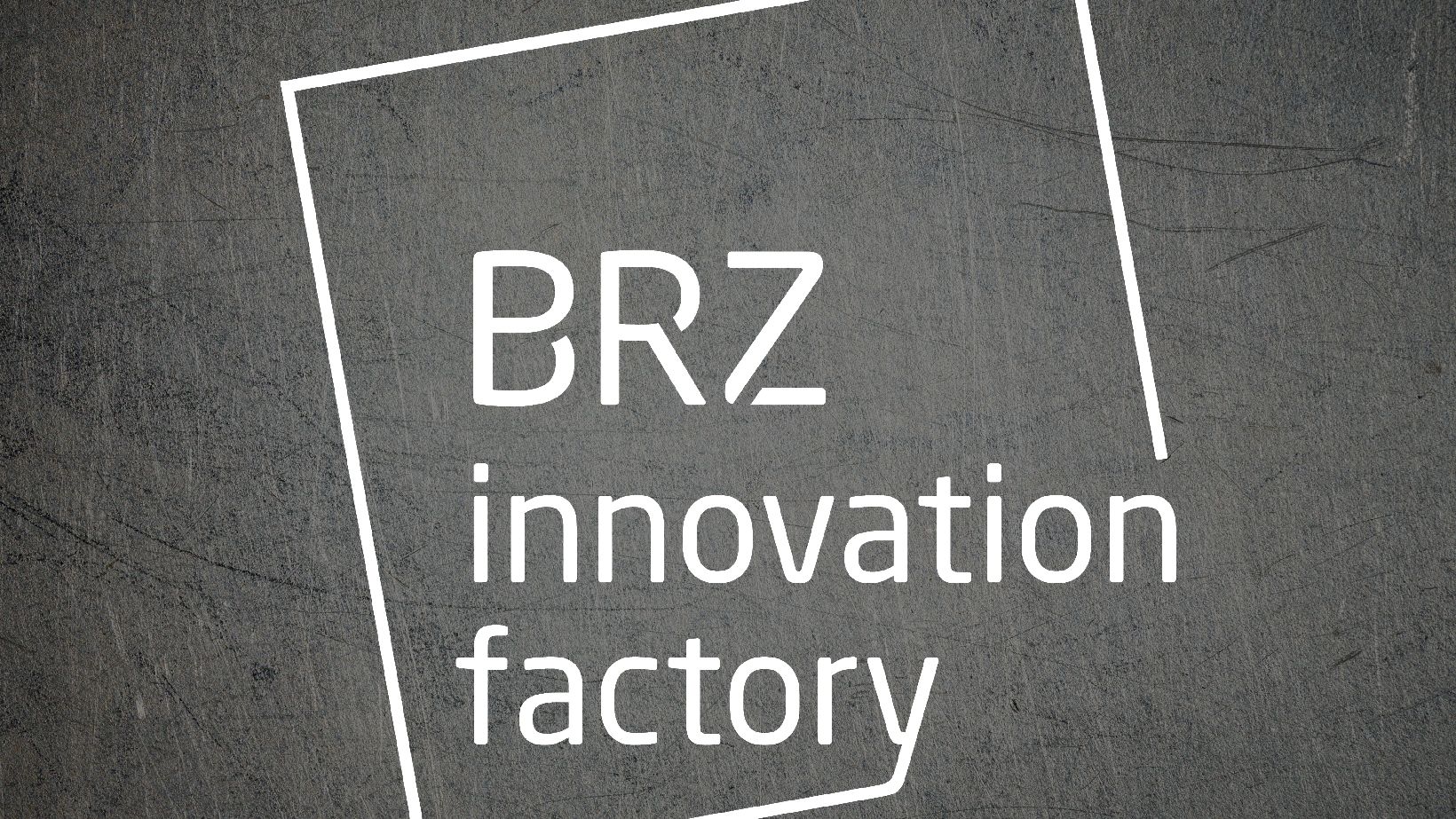 a metaltextured background with white BRZ Innovation Factory Logo