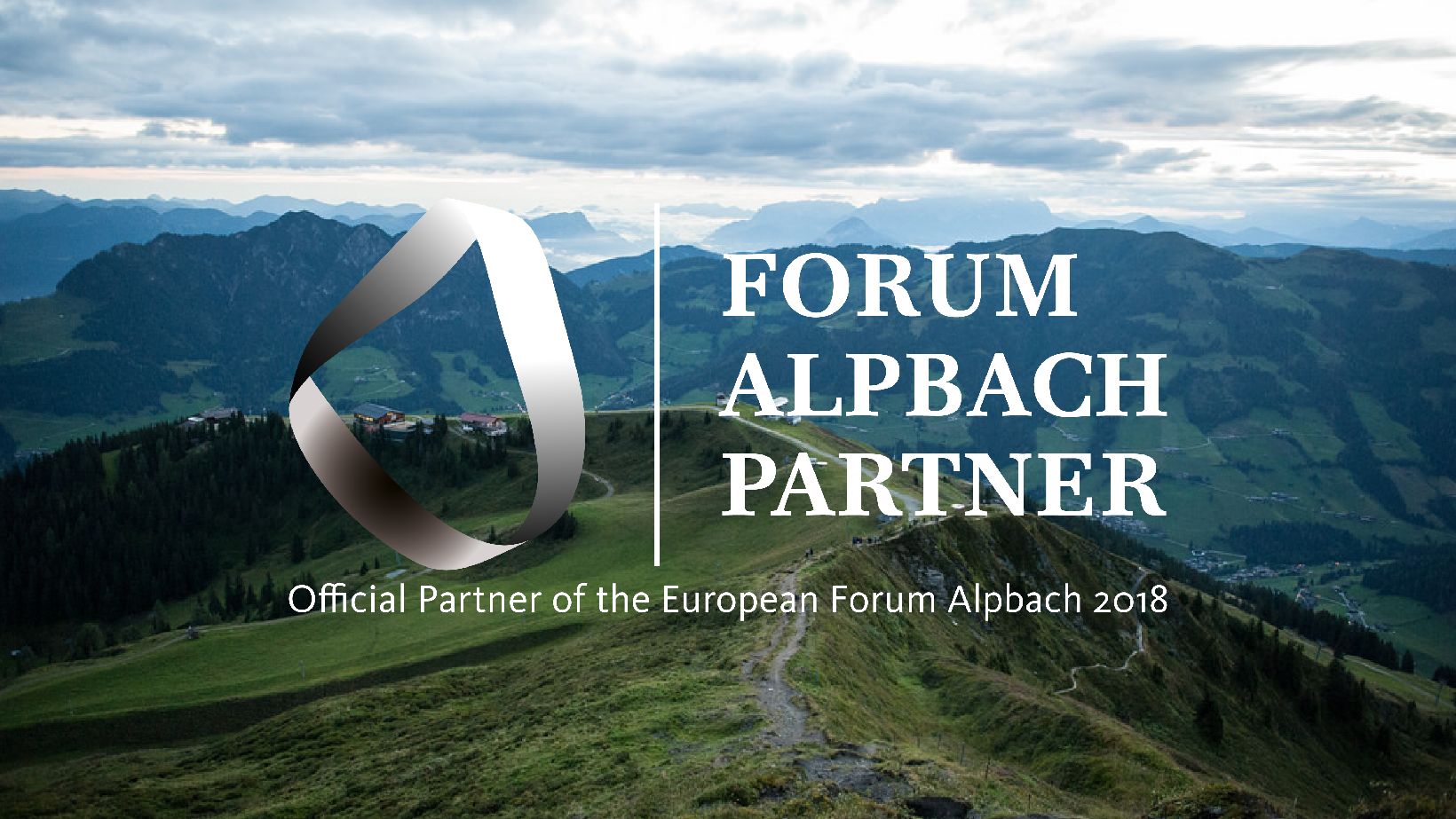 Alpbacher Berge mit "Forum Alpbach Partner" Logo